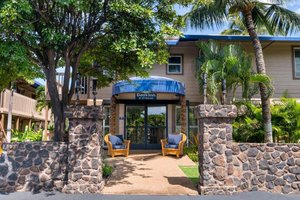 Days Inn by Wyndham Maui Oceanfront in Maui, image may contain: Hotel, Building, Resort, Villa
