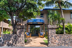 Days Inn by Wyndham Maui Oceanfront in Maui, image may contain: Hotel, Building, Resort, Villa