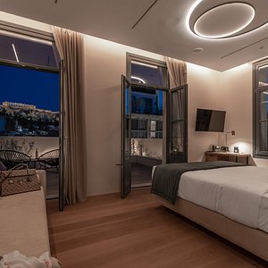 Hellenic Vibes Smart Hotel in Athens, image may contain: Penthouse, Bed, Furniture, Handbag