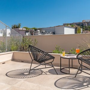 Hellenic Vibes Smart Hotel in Athens, image may contain: Penthouse, Bed, Furniture, Handbag