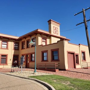 The Slaton Harvey House.  Opened in 1912 as an eating room along the route of the Santa Fe Railroad.   Escaped demolition and today serves as a Bed and Breakfast, event hall and museum. 