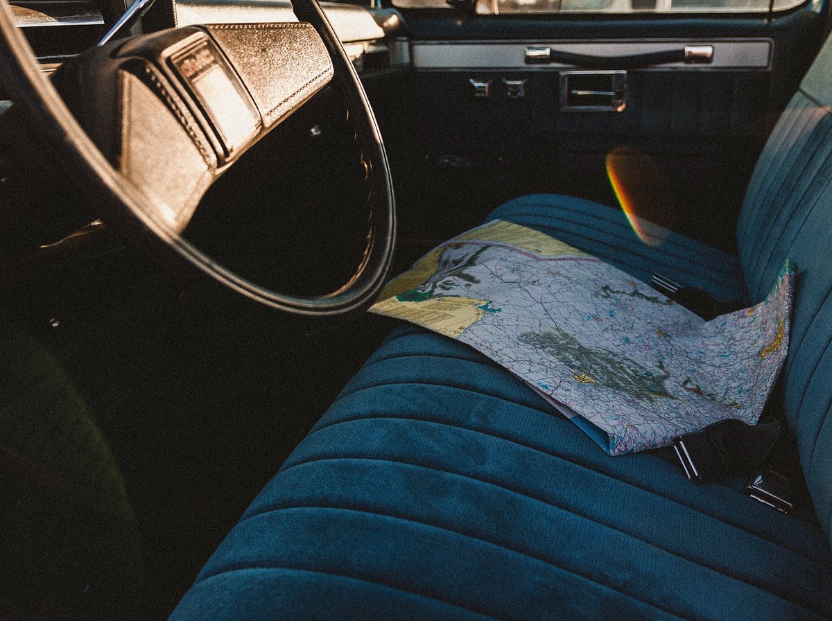 Map sitting inside of car seat