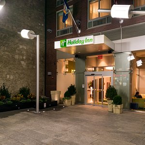 Hotel Entrance in the Evening- Holiday Inn Times Square