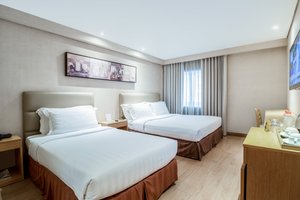Jinjiang Inn Ortigas in Luzon, image may contain: Furniture, Bed, Dorm Room, Bedroom