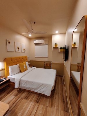 Bloom Hotel - Worli in Mumbai, image may contain: Corner, Ceiling Fan, Wood, Interior Design