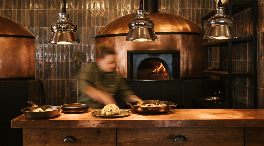 Open-plan, wood fired ovens.