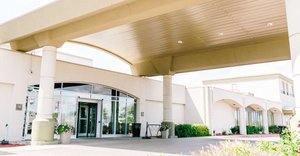 Victoria Inn Hotel & Convention Centre in Winnipeg, image may contain: Villa, Housing, Door, Portico