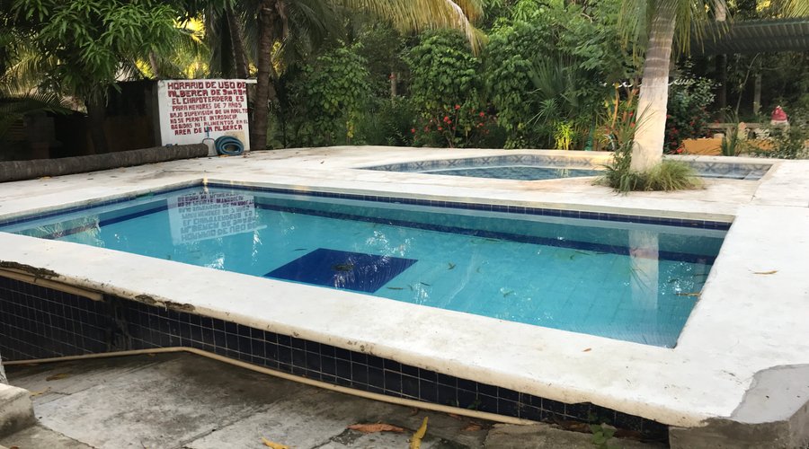 this is the pool as we saw it, damaged, dirty and not at all like the pool in the photos on the booking sites. 