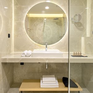 Fresh and spacious bathrooms with rainfall walk in shower