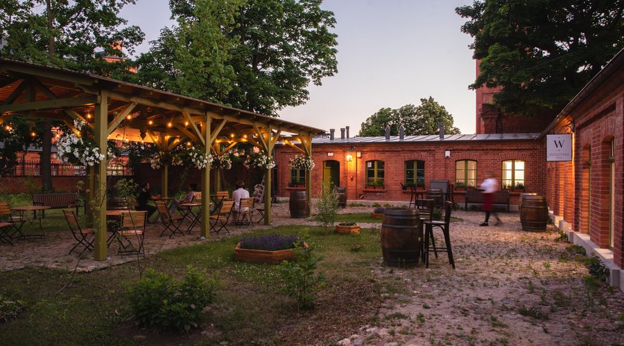 Secret garden in city centre of Lodz.  Situated in a corner od one of Lodz main atractions  Priest Mill post industial revitalization project awarder by European contests.