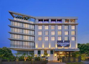 Country Inn & Suites by Radisson, Manipal in Manipal, image may contain: Hotel, Office Building, Inn, Resort