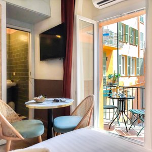 Aparthotel AMMI Vieux Nice in Nice, image may contain: Balcony, Chair, Screen, Monitor