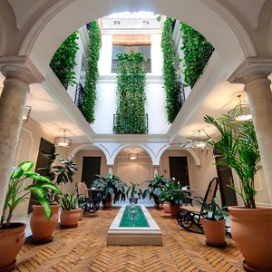 Hotel Gravina51 in Seville, image may contain: Villa, Floor, Plant, Potted Plant