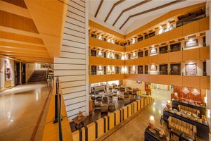 Hotel Grand Mahal in Srinagar, image may contain: Interior Design, Cafeteria, Restaurant, Wood