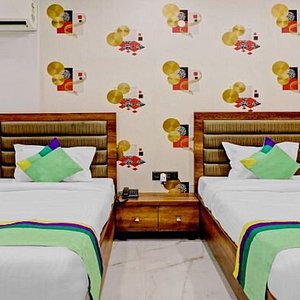 Treebo Trend Hotel Orion Sapphire in Kolkata (Calcutta), image may contain: Furniture, Bed, Bedroom, Indoors