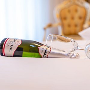 Admiral Sparkling Wine on the bed in Hotel Suite