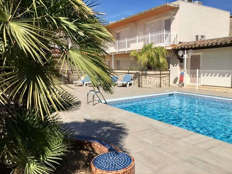 Phare de la Méditerranée between two hotels in Palavas les Flots, near  Carnon Plage, Montpellier, Occitanie, South of France Stock Photo - Alamy