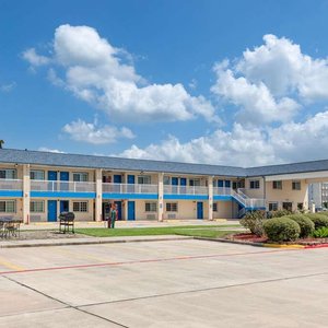 Days Inn by Wyndham Baytown TX in Baytown, image may contain: Hotel, Building, Motel, Person