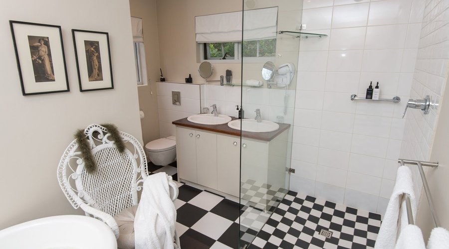 Bathroom in Great Gatsby room.  His and hers basins. 