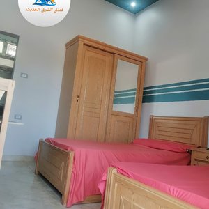 أهلاً وسهلاً بحضراتكم إستضافتكم تسعدنا  يشرفنا إستقبالكم في فندق الشرق الحديث في قلب مدينة رأس البر متوفر لدينا غرف مكيفة مجددة بالكامل بمستويات مختلفة لتتناسب مع الجميع مع اطلالة رائعة علي شارع بورسعيد بجوار جميع الخدمات الحيوية بالمدينة  Welcome to your presence, We are pleased to host you  at Al Sharq Modern Hotel in the heart of Ras Al Bar . We have fully renovated rooms with different types to suit all the wonderful views of Port Said Street next to all the vital services in the city