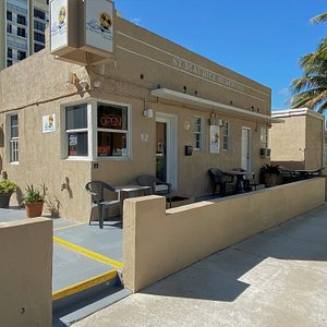 St Maurice Beach Inn in Hollywood, image may contain: Neighborhood, Street, City, Plant