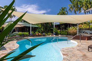 Palms City Resort in Darwin, image may contain: Hotel, Resort, Villa, Pool