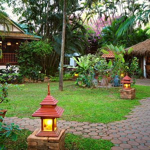 A view into the main garden area, with the Mandalay house to the left, and Dining area to the right.