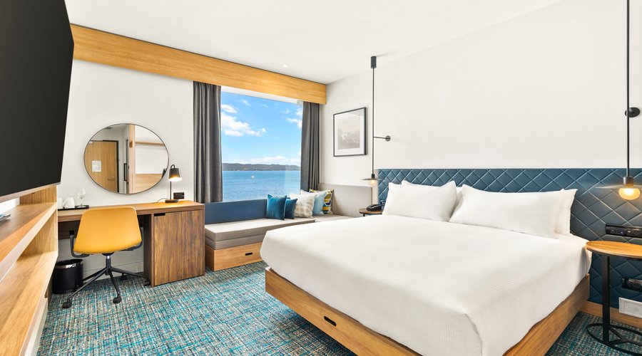 KING GUEST ROOM OCEAN VIEW
Relax in this thoughtfully designed 24 sq. m King Guest Room boasting Ocean Views. Enjoy a restful night’s sleep in our comfortable Suite Dreams® by Serta King bed and fresh, white, crisp linens with plush hypoallergenic pillows. Refresh your well-travelled body under the rain shower and treat yourself to our Hilton Garden Inn signature revitalising amenities from Crabtree & Evelyn.
Work in comfort at the desk with an ergonomic chair. Watch a program on the 55inch HDTV