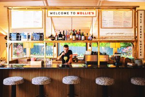 Mollie's Motel & Diner Bristol in Bristol, image may contain: Restaurant, Indoors, Cafe, Person