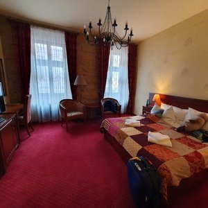 Hotel Rous in Pilsen, image may contain: City, Neighborhood, Grass, Car