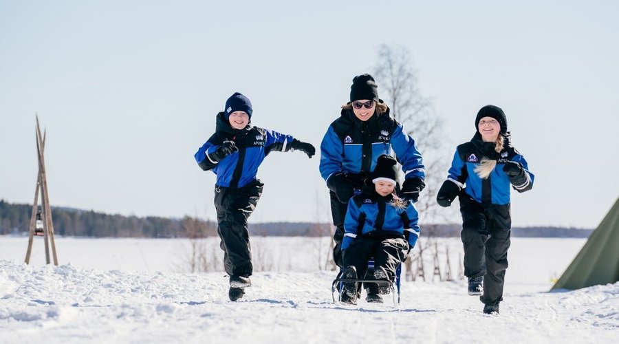Family fun in Apukka Resort Rovaniemi in Lapland Finland. 
