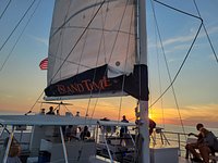 sunset & dolphin catamaran cruise with island time