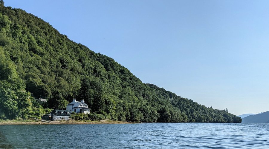 A view of Rossmay House from the waters of Loch Long