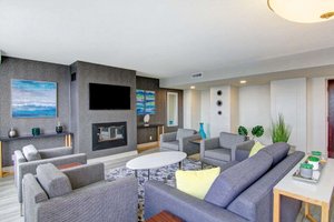 The Park Hotel London in London, image may contain: Couch, Home Decor, Living Room, Table