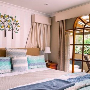 Amble Wren Spa Cottage. Perfect romantic getaway. Relax in the spa bath or on the private verandah. 