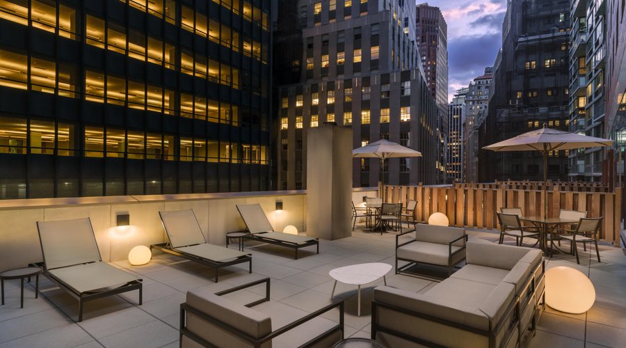 Located just off of the fitness center, escape the hubbub of the city with our 5th floor terrace area with a drink before going out, leisurely work throughout the day, or use the space for your morning yoga routine.   