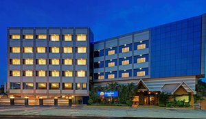 Comfort Inn Sunset in Ahmedabad, image may contain: Hotel, Office Building, Resort, Condo