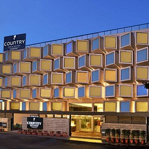 Country Inn & Suites by Radisson, Bengaluru Hebbal Road in Bengaluru, image may contain: Office Building, Hotel, Condo, City