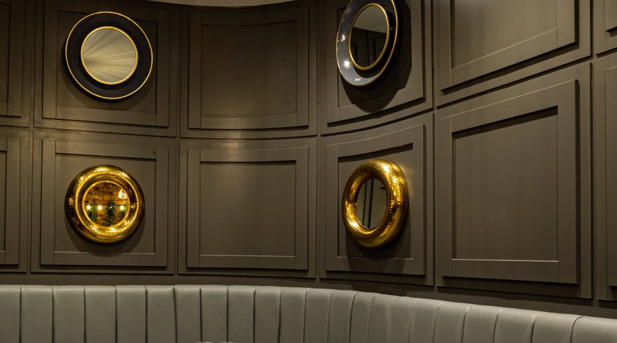 The luxurious cosy corner seating, surrounded by modern contemporary decor.