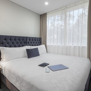 Meriton Suites North Ryde in North Ryde, image may contain: Living Room, Couch, Coffee Table, Table