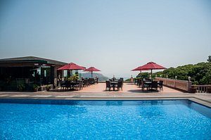 Brightland Resort & Spa in Mahabaleshwar, image may contain: Resort, Hotel, Villa, Pool