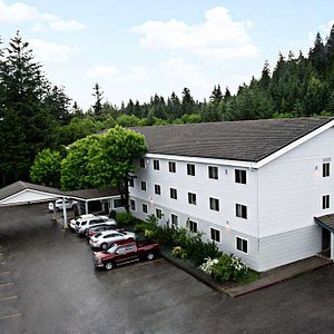 Super 8 by Wyndham Juneau in Juneau, image may contain: Hotel, Tree, Outdoors, Pickup Truck