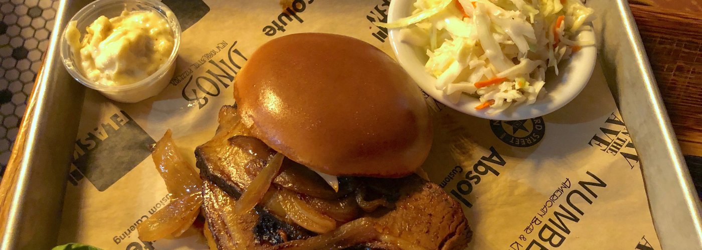 The wet brisket sandwich with sides.