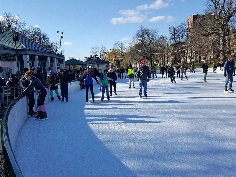 Ice skaters enjoy the sunshine at Boston Common Frog Pond