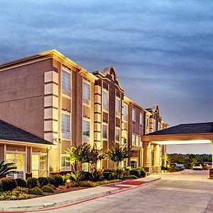 Super 8 by Wyndham San Antonio/Alamodome Area in San Antonio, image may contain: Hotel, City, Condo, Neighborhood