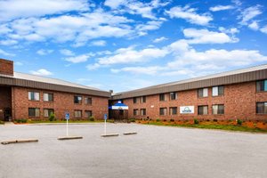 Days Inn by Wyndham Midland in Midland, image may contain: Hotel, Building, City, Office Building