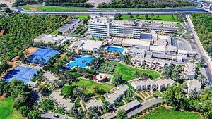 Radisson Blu Hotel & Resort, Al Ain in Al Ain, image may contain: Building, Hotel, Resort, Pool