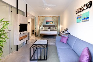 Regenta Inn Palacio De Goa in Panjim, image may contain: Living Room, Couch, Monitor, Table