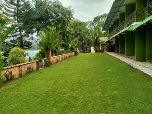 Elephant Pass Ayurveda & Yoga Retreat in Ernakulam, image may contain: Hotel, Resort, Villa, Grass