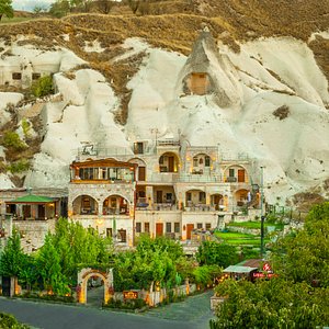 Helen Cave Suites in Goreme, image may contain: Arch, Villa, Garden, Gate